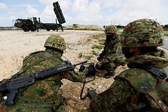 Япония укрепит обороноспособность за счет возможности нанесения ответных ударов: Политика: Мир: Lenta.ru0